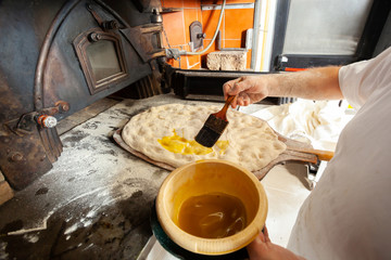Schiacciata is a kind of bread made in Tuscany, Italy.