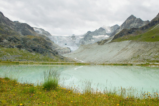 Landscape in Switzerland of glacier du moiry and a lake