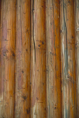 The texture of a wooden wall of the house. painted in brown color.
