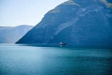 Fototapeta na wymiar Lonely ship in blue sea. Beautiful scenic in north europe