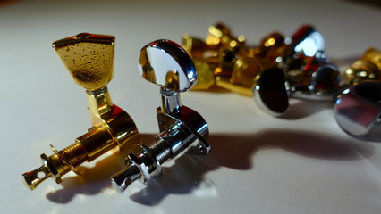 guitar tuning pegs . color background