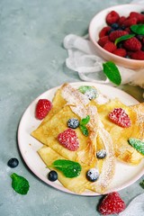 Homemade Crepes with fresh fruits and berries, selective focus