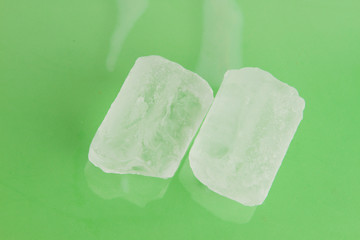 ice cubes on colorful background