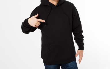 Man in black sweatshirt pointed hand, black hoodies front isolated, mock up,copy space cropped image