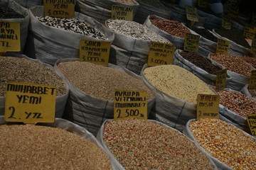 Heap of nuts, seeds and dried fruits in bags