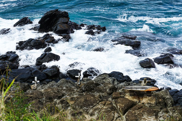 Monument to surfers who died surfing on a beach in Maui.
