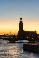Fototapeta premium Silhouette of the iconic Stockholm City Hall at dusk, Stockholm, Sweden