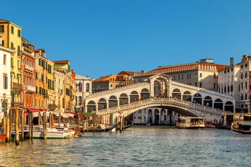 The Rialto Bridge (Ponte di Rialto), the oldest of the four bridges spanning the Grand Canal in Venice, Italy.