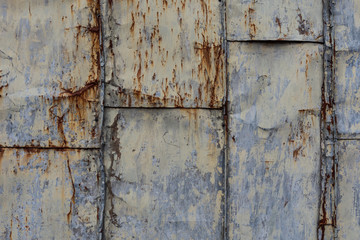 The old iron wall of a building
