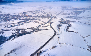 Fototapeta na wymiar Amazing aerial view of a winter Landscape by the drone