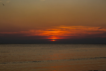 View of beautiful sunset over the sea in the evening, Thailand. 