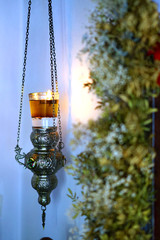 Original and ancient lamp in a small Orthodox church in Paros