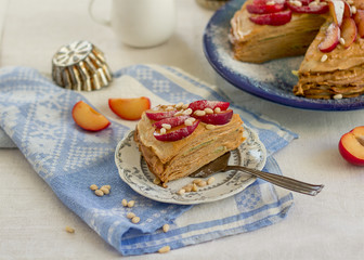 Pancake pie with caramel cream and fruit