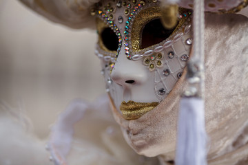 Unidentified person with Venetian Carnival mask in Venice, Italy on February