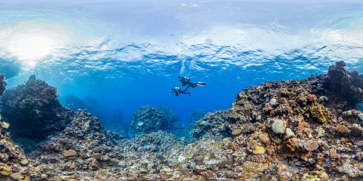 360 of divers on reef in Okinawa