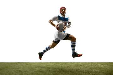 Plakat The silhouette of one caucasian rugby man player isolated on white background. Studio shot of fit man in motion or movement with ball. Jump and action concept. an incredible strain of all forces