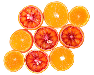 Slices of blood orange and mandarin isolated top view
