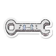 distressed sticker of a cartoon crying spanner