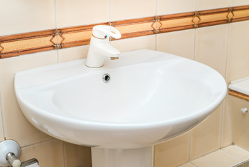 The photo of a sink in a bathroom