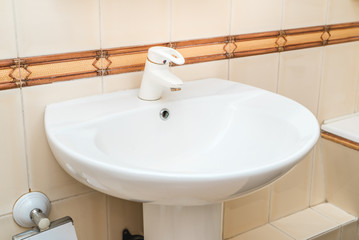 The photo of a sink in a bathroom
