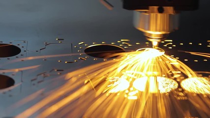 CNC Laser cutting of metal, modern industrial technology.