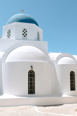 Fototapeta na wymiar Church at Pyrgos town in Santorini island, Greece