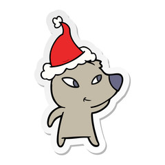 cute sticker cartoon of a bear wearing santa hat