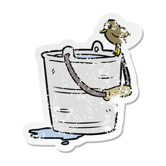 distressed sticker of a cartoon bucket of water