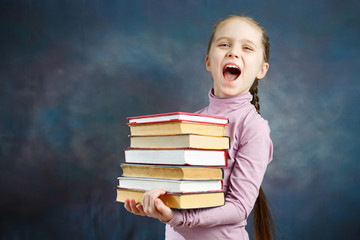 Cheerful Elementary Schoolgirl Hold Book Bunch