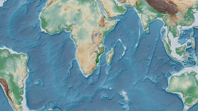 Mozambique area presented against the global physical map in the Kavrayskiy VII projection with animated oblique transformation