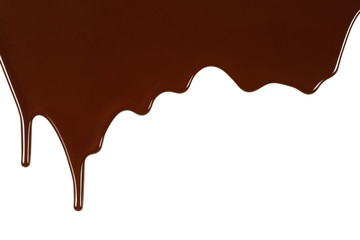 Melted chocolate dripping on white background