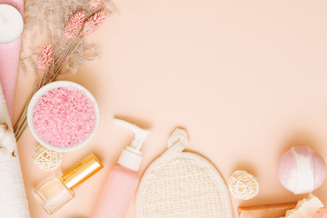 Body care cosmetic spa set. Healthy relaxation lifestyle. Copy space on coral pink background.