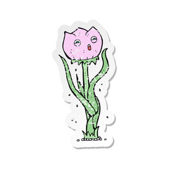 retro distressed sticker of a cartoon flower