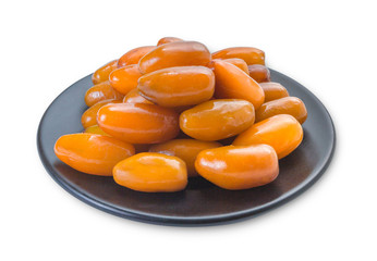 Dried dates in plate on white background