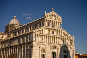 The leaning tower of pisa at Piazza del Miracoli Duomo square,Camposanto cemetery in Tuscany, Italy