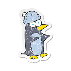 Obraz na płótnie Canvas retro distressed sticker of a cartoon penguin