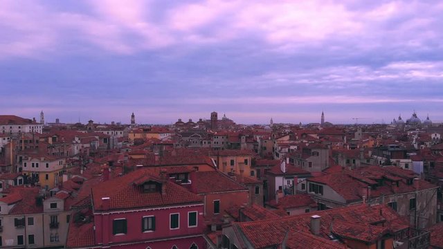 The city of Venice Italy filmed during Sunrise while the drone is flying upwards. Filmed with a DJI Mavic Air in 4k