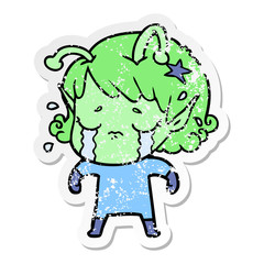 distressed sticker of a cartoon crying alien girl