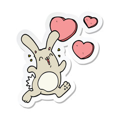 sticker of a cartoon rabbit in love