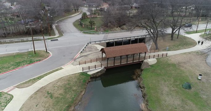 This is an aerial video of Bear Creek Park in Keller Texas.  This is a bridge at the lower end of the park.