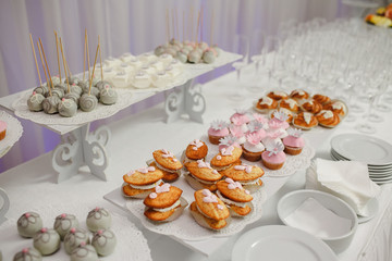 Candy bar with sweets and cakes. Background texture