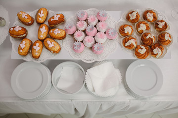 Candy bar with sweets and cakes. Background texture