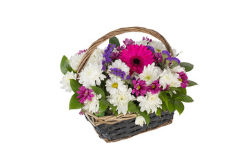 Fototapeta na wymiar Bouquet of various colorful flowers in a basket