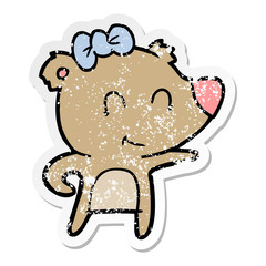 Obraz premium distressed sticker of a female bear cartoon