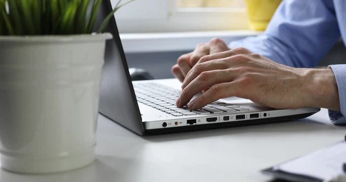 white collar worker working at office on laptop computer