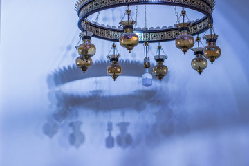 chandelier interior object and abstract soft focus shadow from it on white wall background