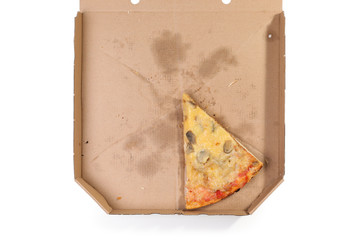 Cardboard box with pizza piece on white background, top view