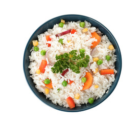 Bowl with tasty rice and vegetables on white background, top view