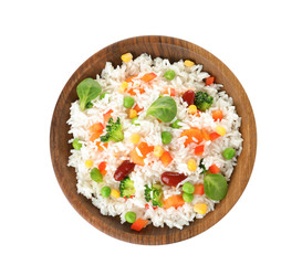 Bowl with tasty rice and vegetables on white background, top view