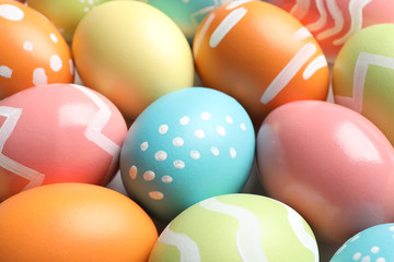 Fototapeta na wymiar Many beautiful painted Easter eggs as background, closeup